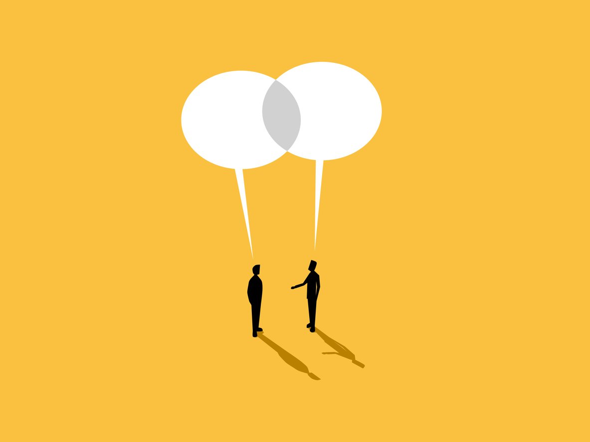 Two people discussing a topic, finding common ground