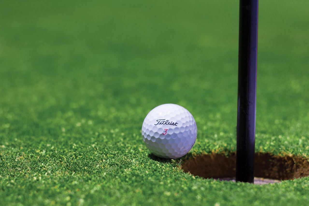 golf ball at hole, golf green