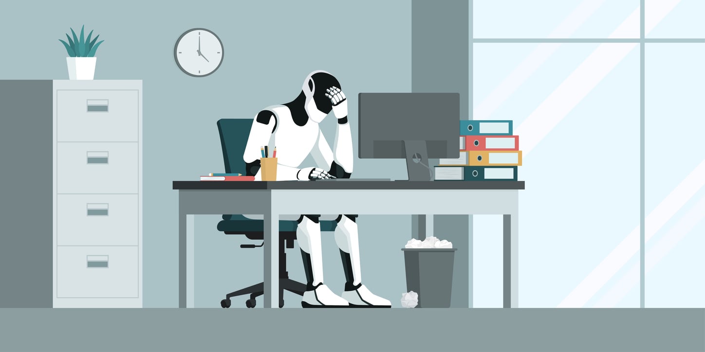 Overworked robot sitting at a desk