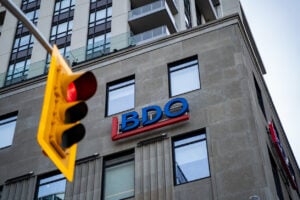 BDO exterior sign with stop light in frame