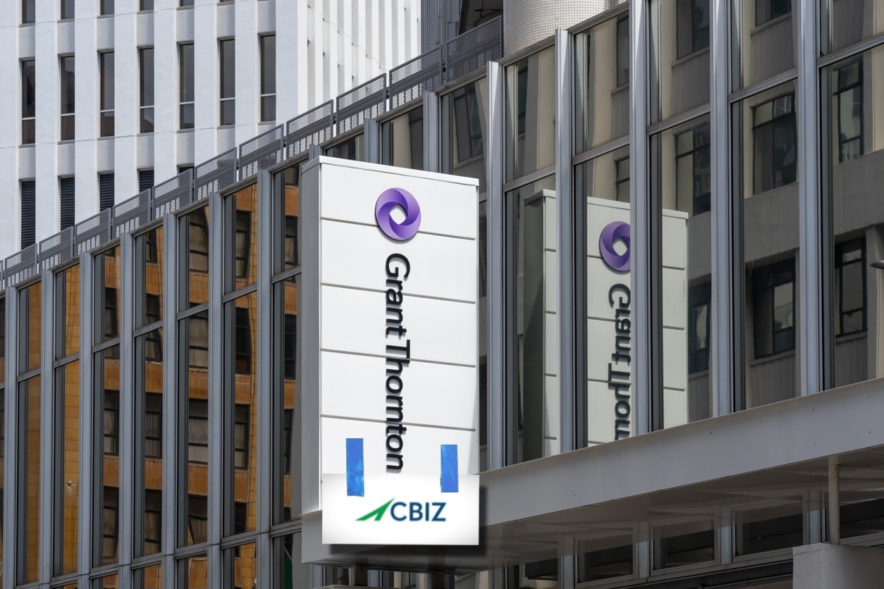 Grant Thornton sign with CBIZ taped on