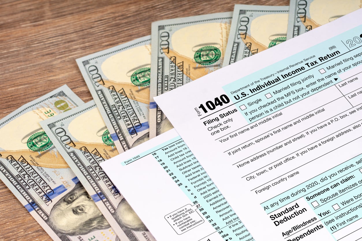 1040 tax return with money